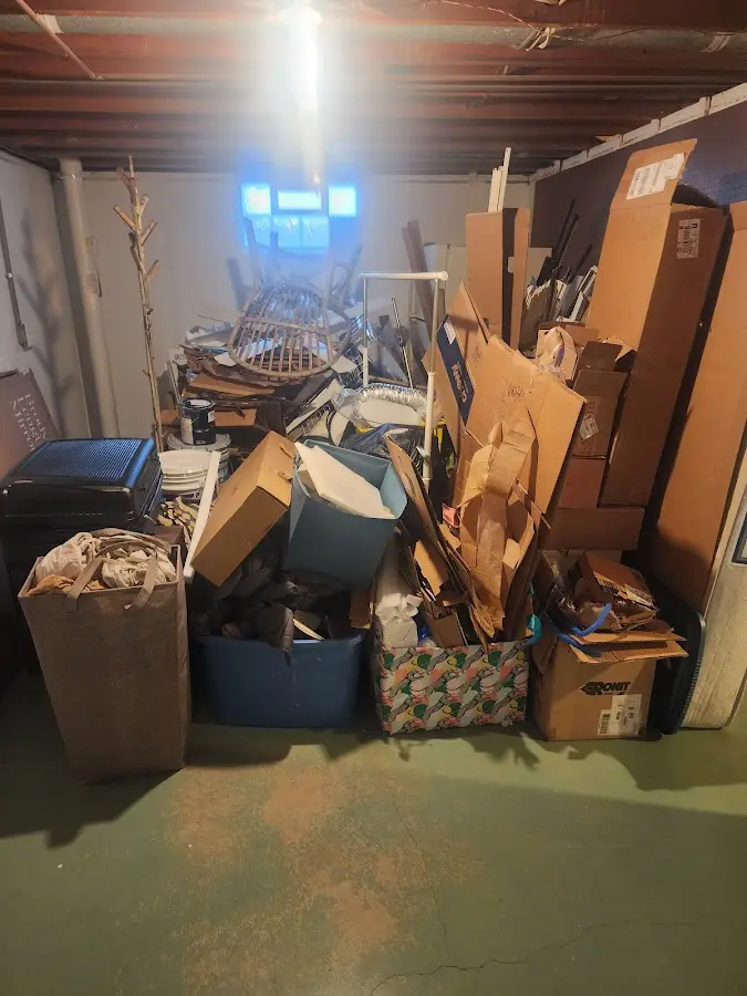 Roll-off dumpster container at job site for 2 Yard Dumpster Rental in Scott City